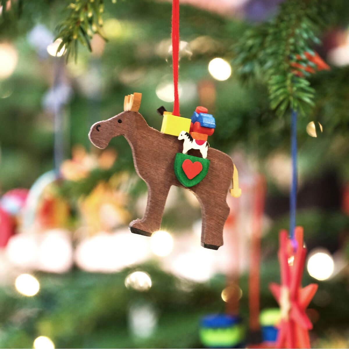 Moose with Toys Ornament with gifts