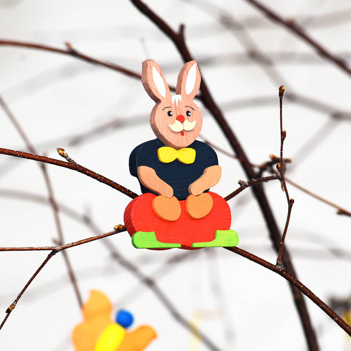 Easter bunny with clip blue jacket & orange pair of pants