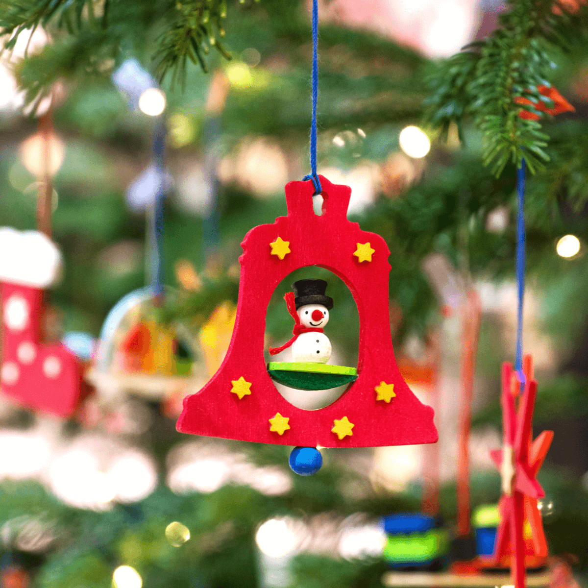 Bell with miniature figures Ornament red with angel